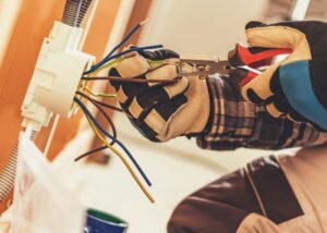 electrician fixing faulty electric 