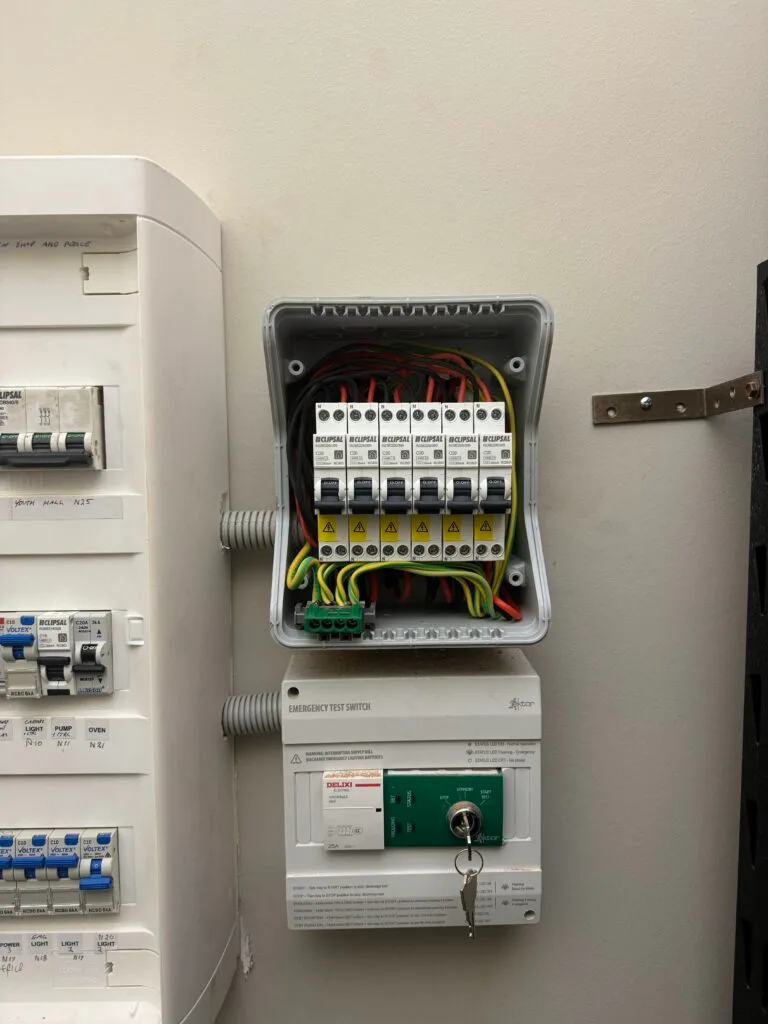 white switchboard against cream coloured wall